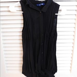Sleeveless black button down